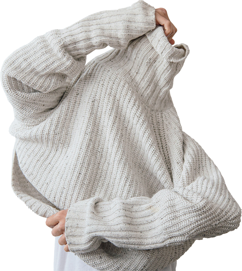A knit worn in the shop window for COMPANY_NAME in TOWN. Replace it with your own piece after you pay.